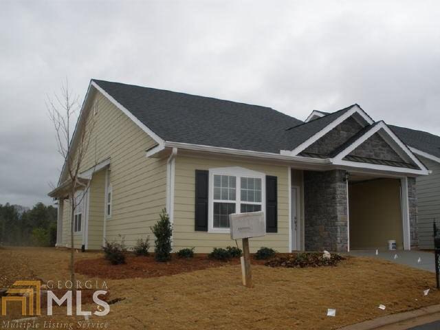 103 Maplecrest Lane Southeast Rome, GA 30161 - Photo 1 of 1 a front view of a house with a yard