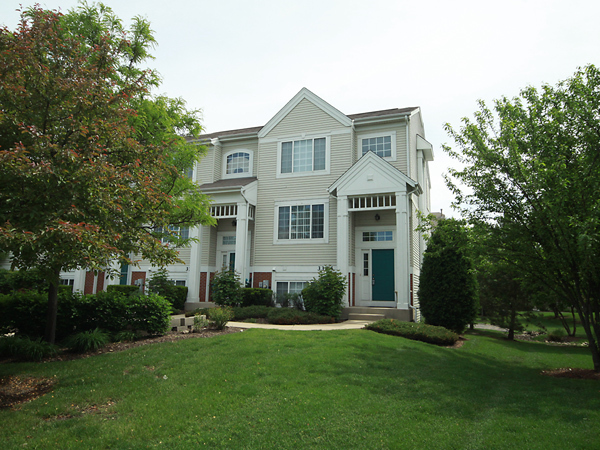 3384 Ravinia Circle Aurora, IL 60504 - Photo 2 of 24 a front view of a house with a yard