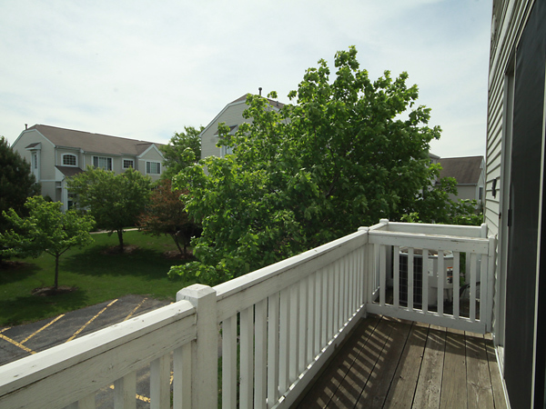3384 Ravinia Circle Aurora, IL 60504 - Photo 23 of 24 a view of a balcony with yard