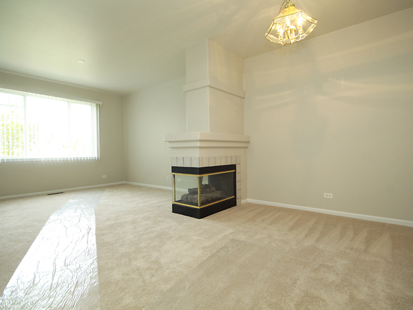 3384 Ravinia Circle Aurora, IL 60504 - Photo 6 of 24 a view of an empty room with a window