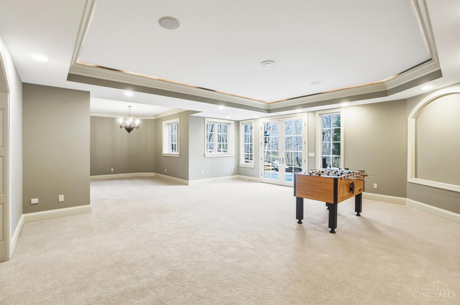 1054 Observatory Point Maineville, OH 45039 - Photo 56 of 82 Walkout lower level. Room for a game table to the left and another patio out those doors.