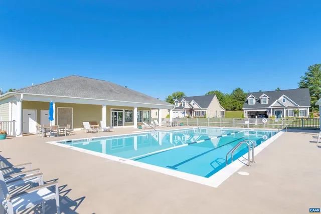 a view of a house with a swimming pool