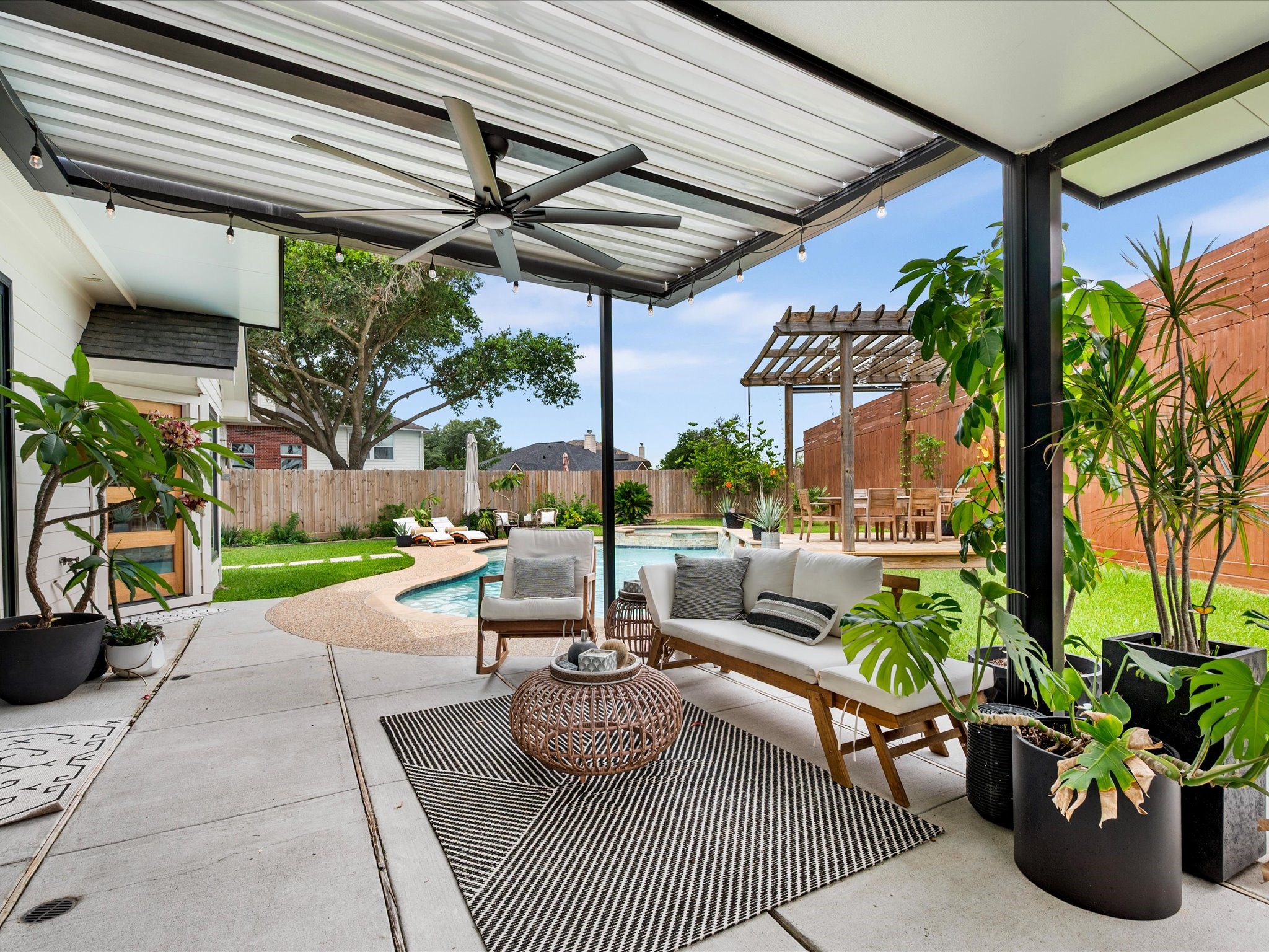 4023 Tigris Ridge Drive Katy, TX 77449 - Photo 29 of 39 Step outside to an incredible backyard retreat designed for relaxation and entertaining alike.