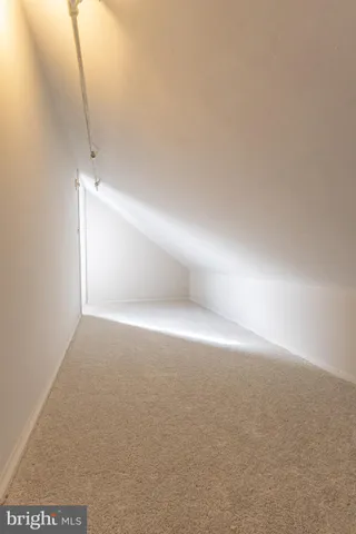 a view of house with a chairs and table in a patio