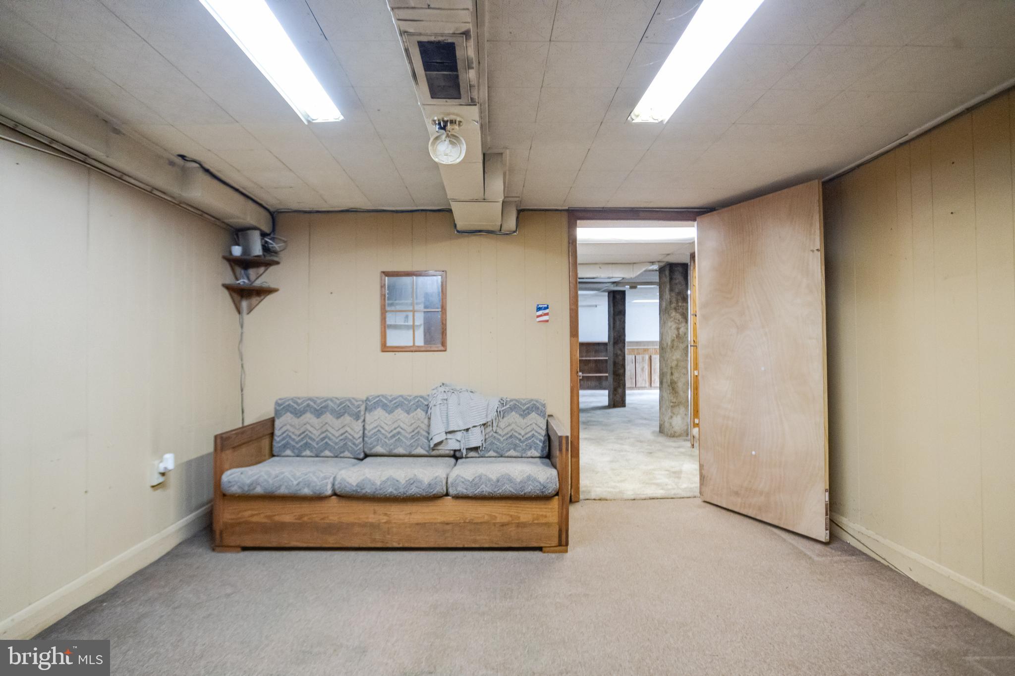 1405 Pomeroy Avenue Abingdon, MD 21009 - Photo 37 of 60 a living room with furniture and a ceiling fan