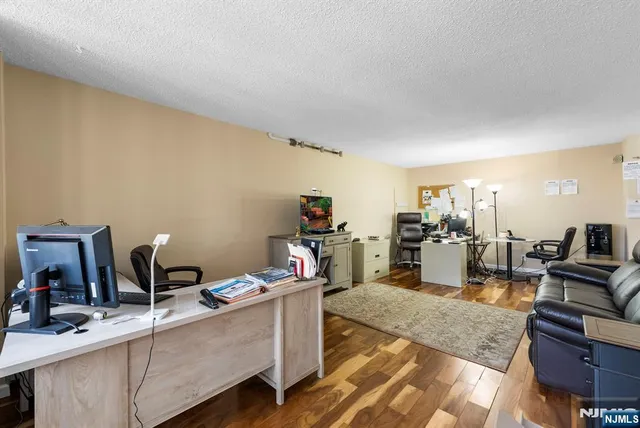 a kitchen that has a sink and a stove in it