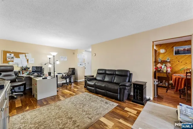 a kitchen with stainless steel appliances granite countertop a sink and stove top oven