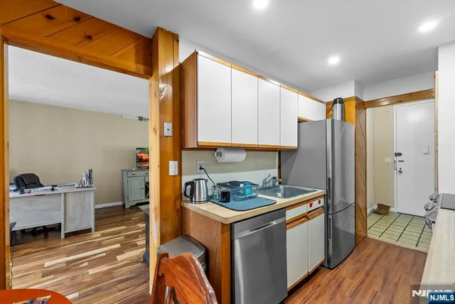 a view of a workspace with furniture