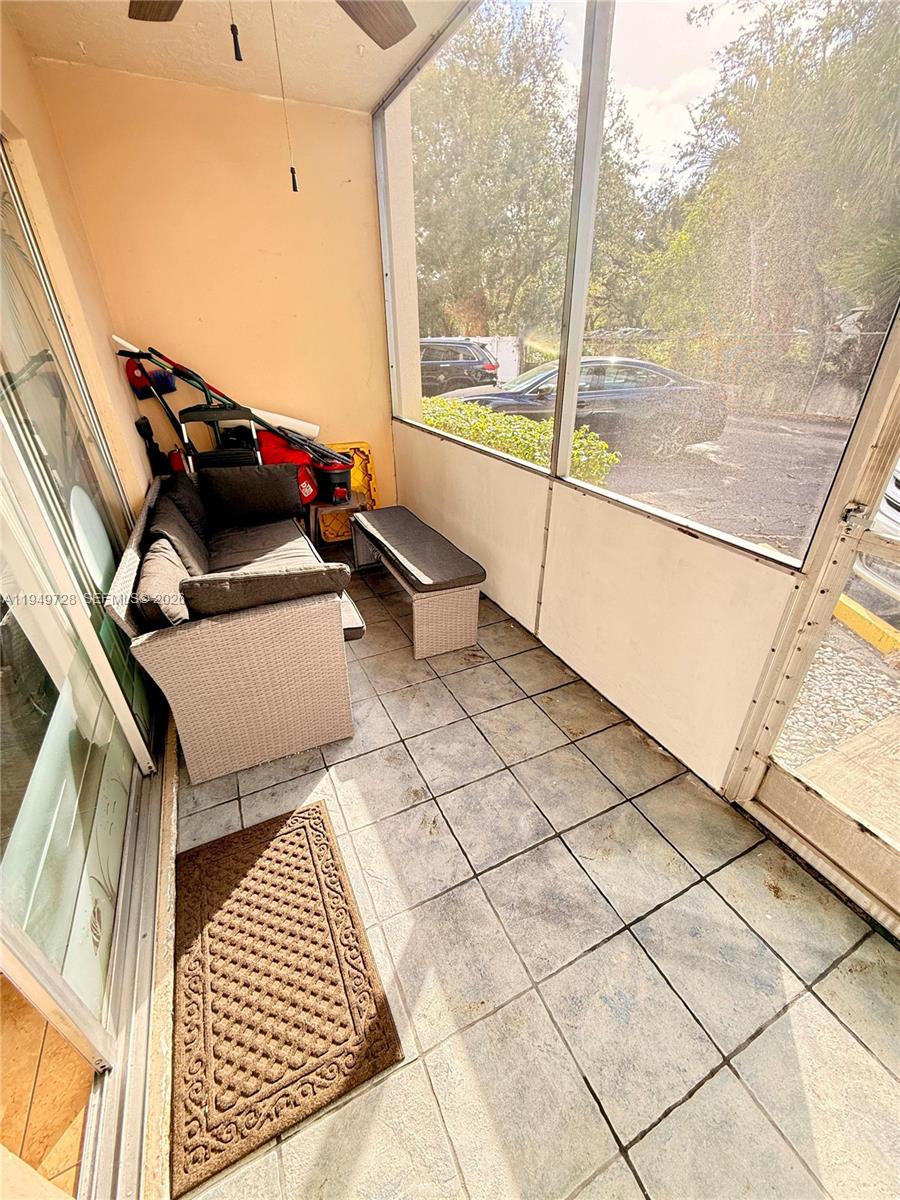 5790 Stirling Road, Unit 104 Hollywood, FL 33021 - Photo 16 of 19 a living room with furniture