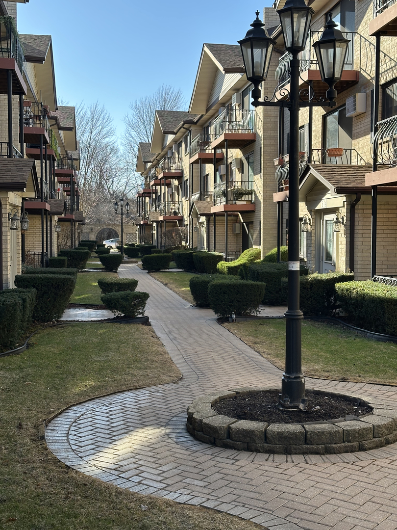 a view of a building with garden