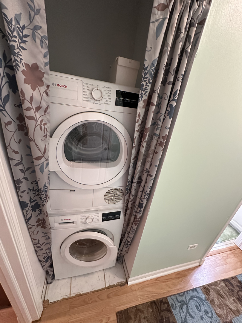 5155 North East River Road, Unit 116E Chicago, IL 60656 - Photo 7 of 10 a utility room with dryer and washer