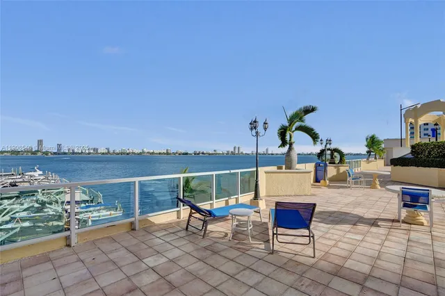 a view of a terrace with furniture