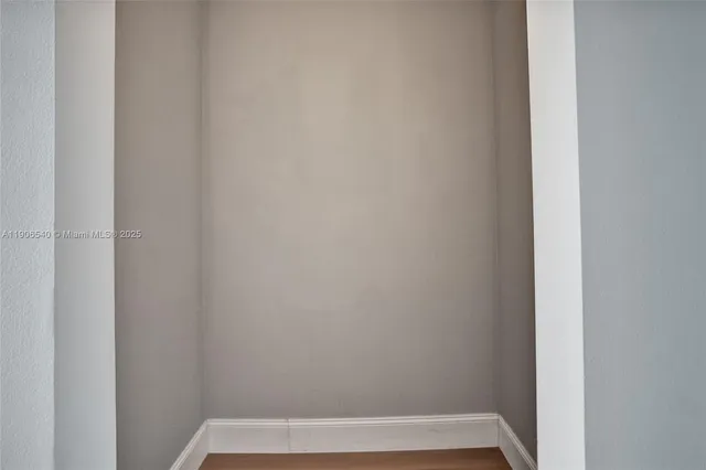 a bathroom with a sink vanity and a mirror