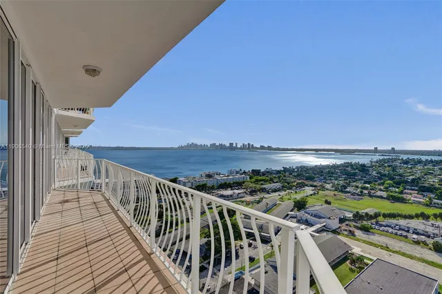 a view of a balcony with an ocean view