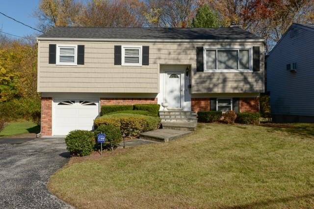 a front view of house with yard