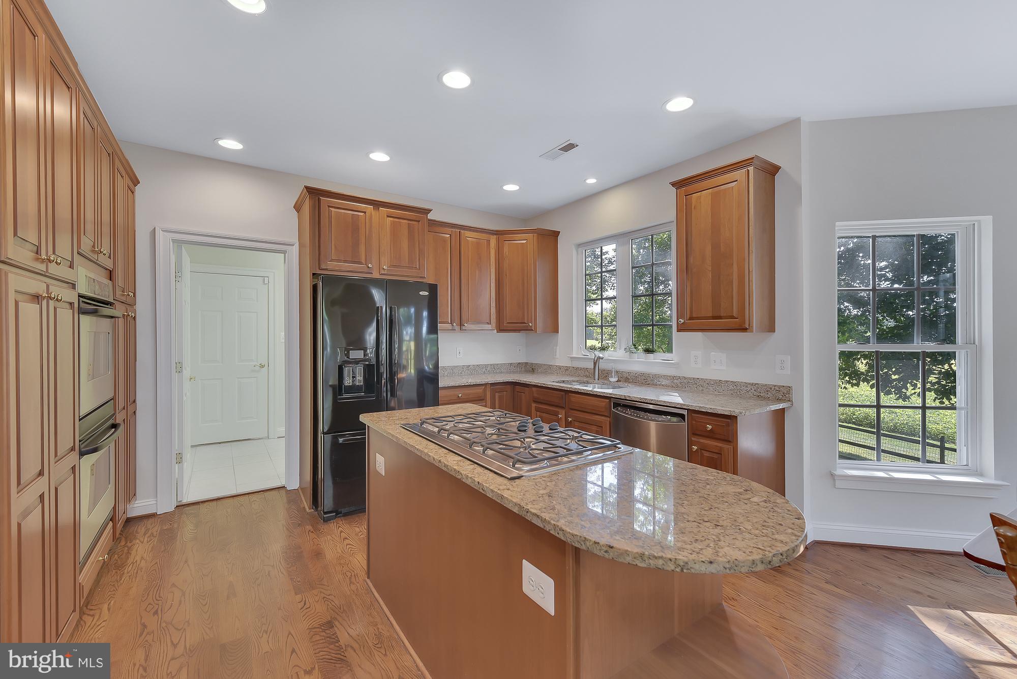 21416 Peach Tree Road Dickerson, MD 20842 - Photo 29 of 76 Perfect island for entertaining or homework!