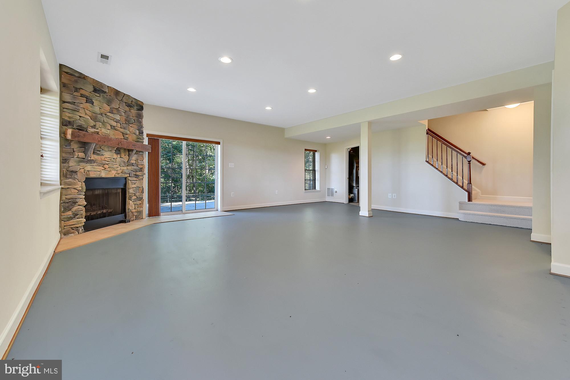 21416 Peach Tree Road Dickerson, MD 20842 - Photo 59 of 76 Another floor to ceiling stone fireplace!