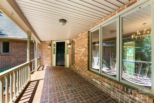 a porch with wooden floor