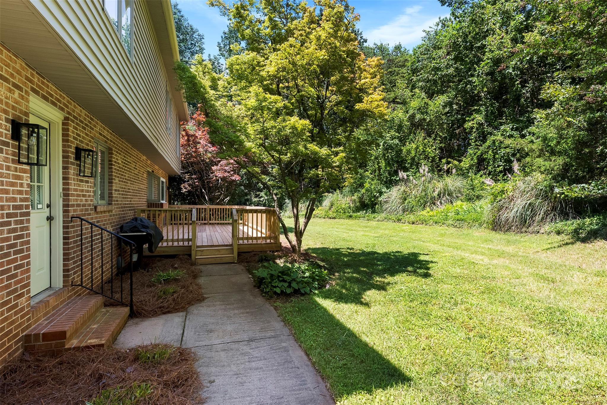 1505 North Cansler Street Kings Mountain, NC 28086 - Photo 37 of 46 a view of a backyard with sitting area