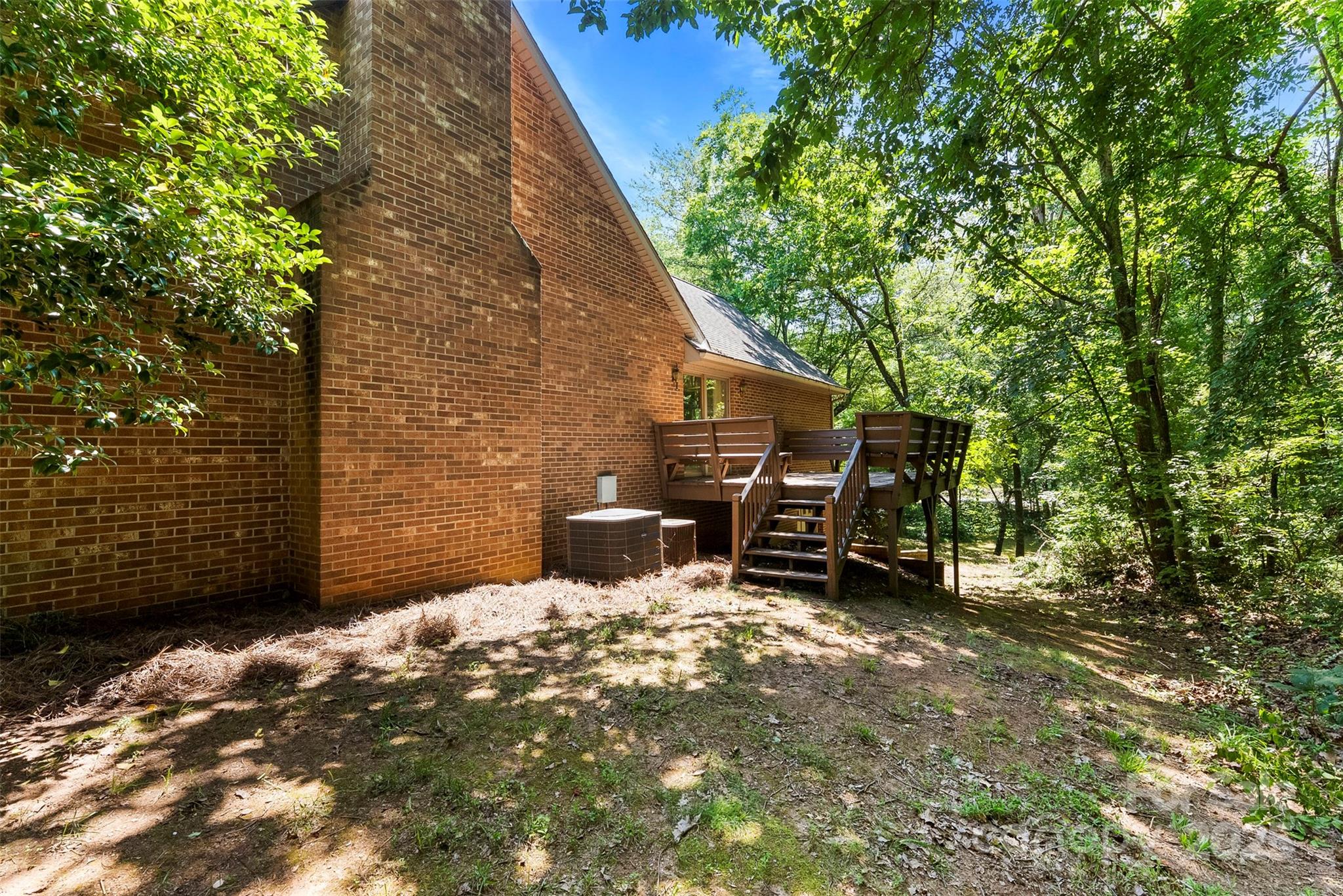 1505 North Cansler Street Kings Mountain, NC 28086 - Photo 39 of 46 a backyard of a house with table and chairs