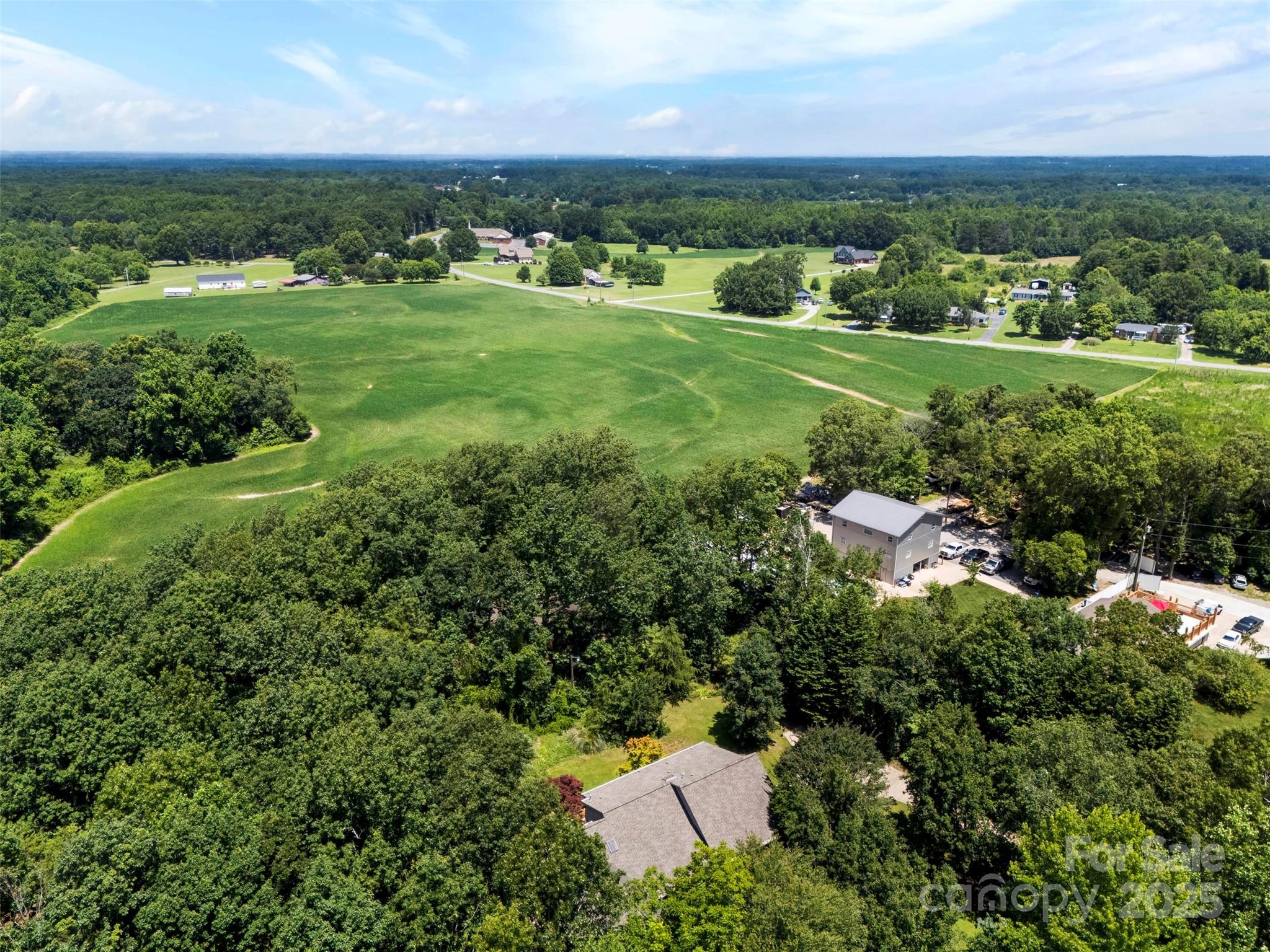 1505 North Cansler Street Kings Mountain, NC 28086 - Photo 43 of 46 an aerial view of a houses with outdoor space and city view