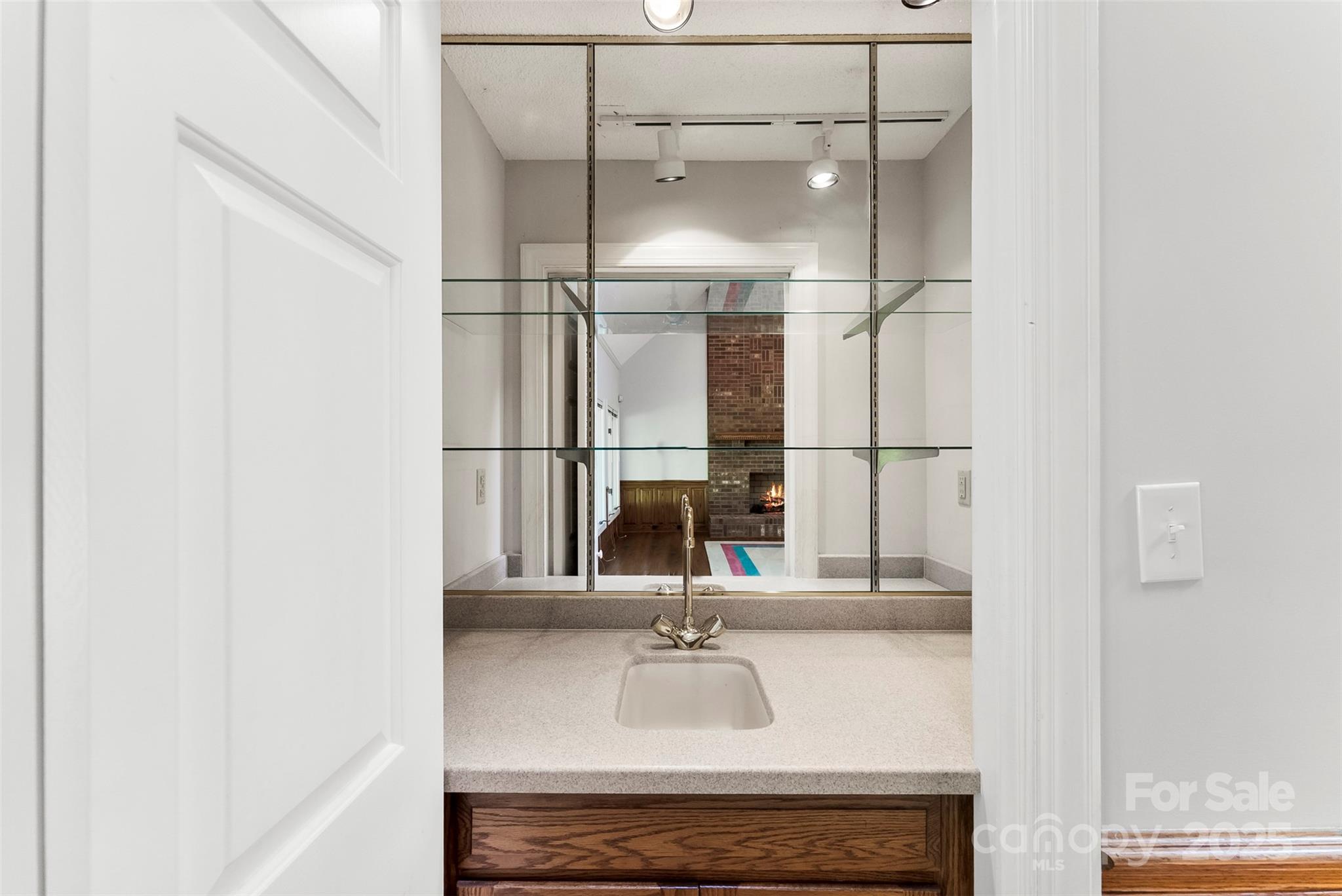 1505 North Cansler Street Kings Mountain, NC 28086 - Photo 7 of 46 a bathroom with a sink and a mirror