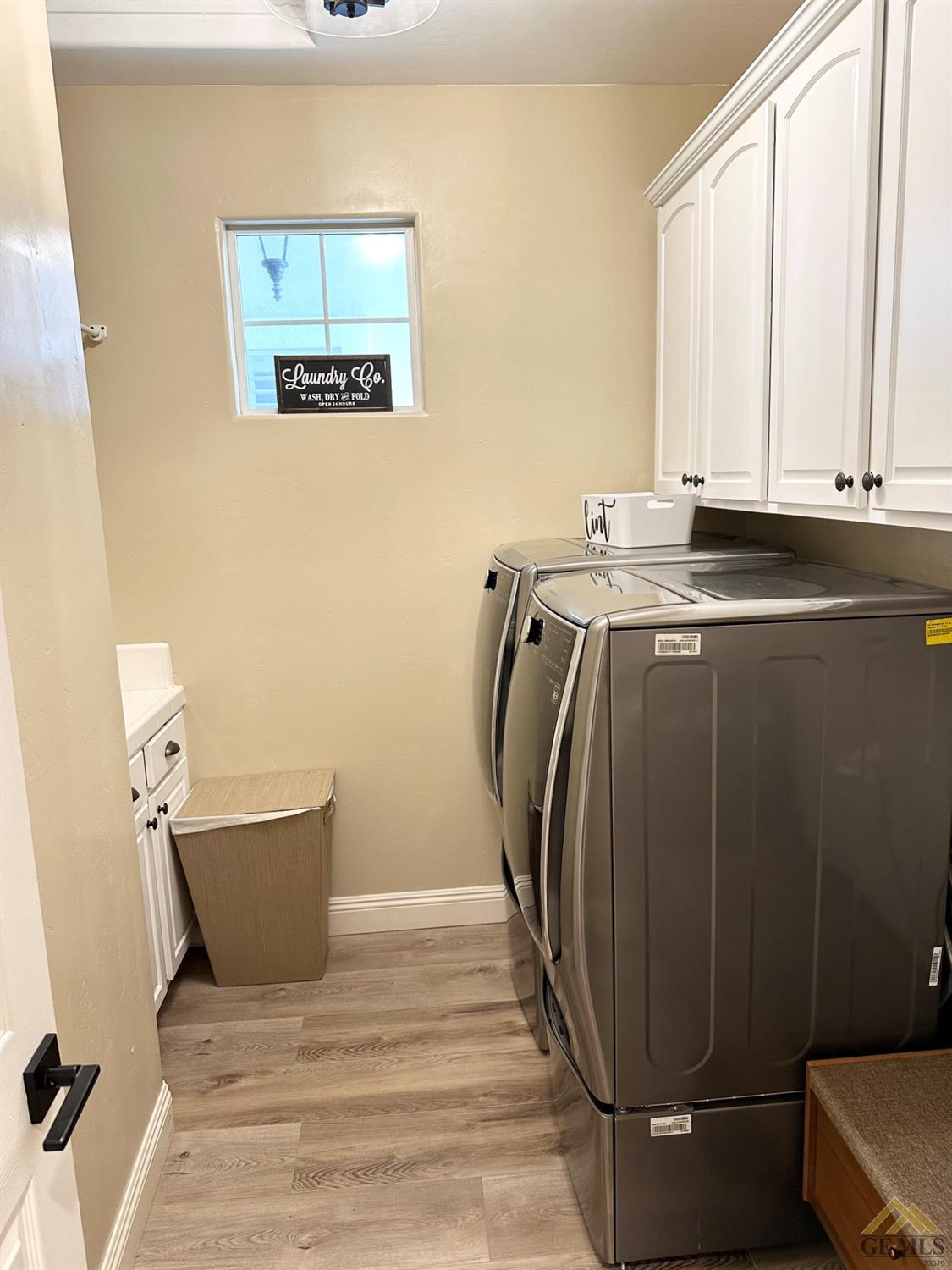 Undisclosed Address Bakersfield, CA 93311 - Photo 12 of 30 a bathroom with a sink and a mirror