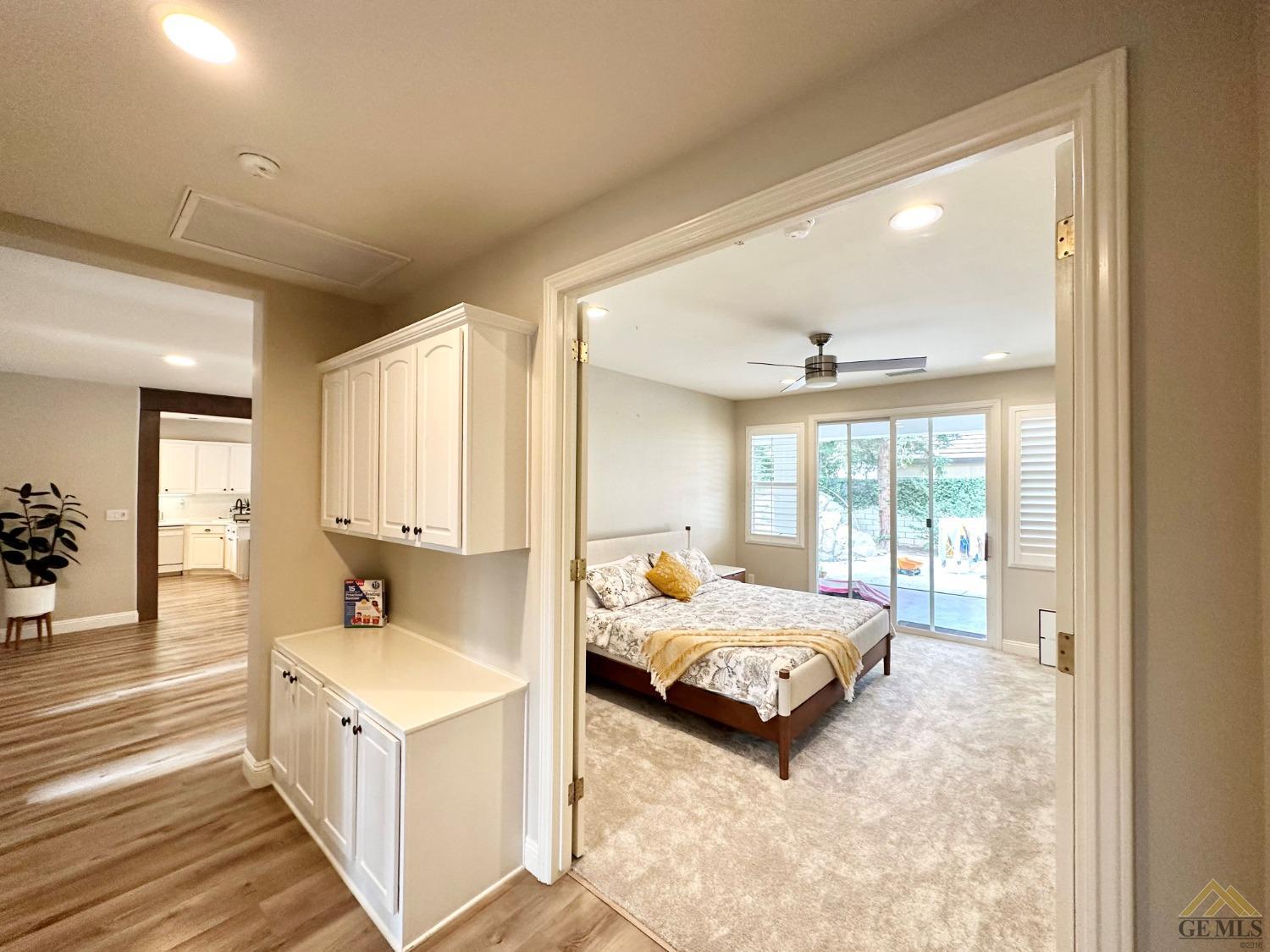 Undisclosed Address Bakersfield, CA 93311 - Photo 17 of 30 a spacious bedroom with a bed and a large window