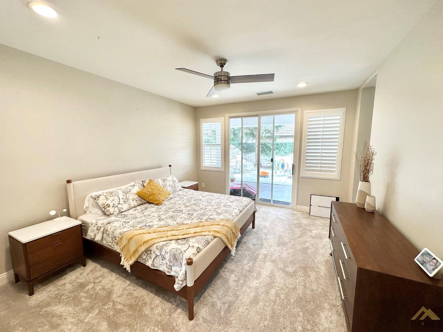 Undisclosed Address Bakersfield, CA 93311 - Photo 18 of 30 a large bedroom with a bed and window