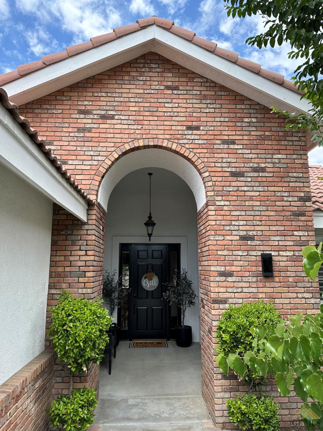 Undisclosed Address Bakersfield, CA 93311 - Photo 2 of 30 a front view of a house with plants