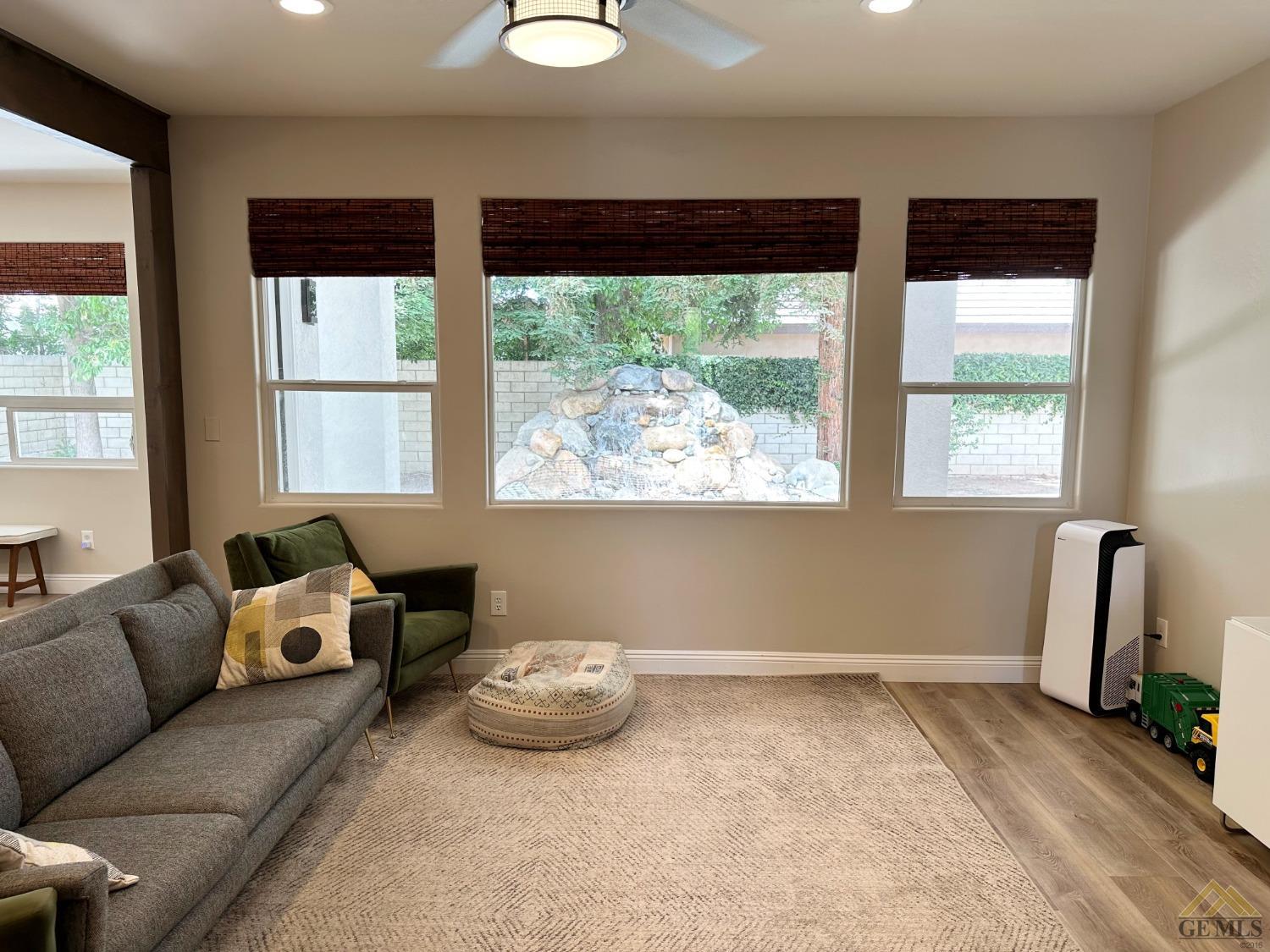 Undisclosed Address Bakersfield, CA 93311 - Photo 26 of 30 a room with furniture and window