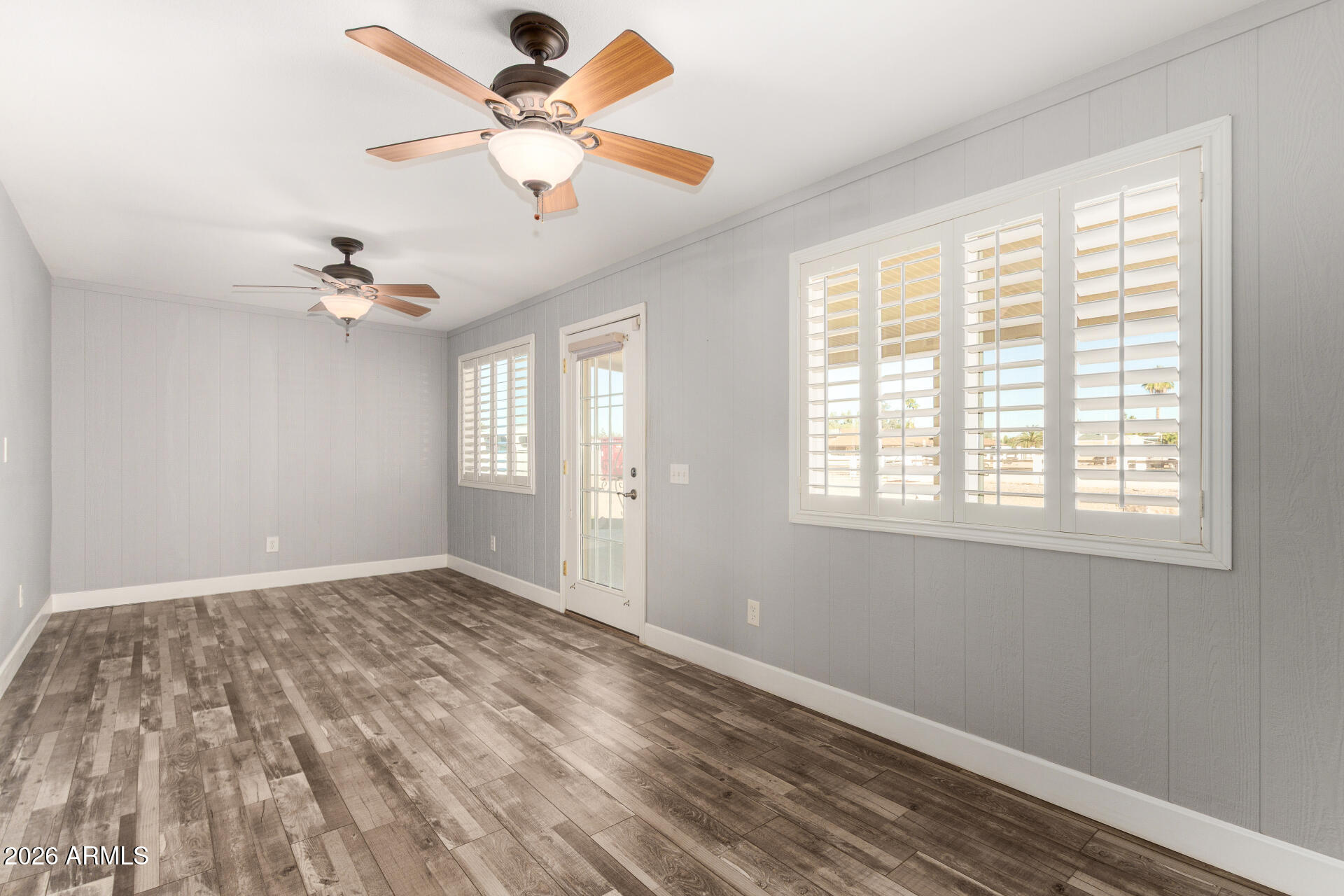 11118 West Mountain View Road Sun City, AZ 85351 - Photo 13 of 34 a view of an empty room with a window