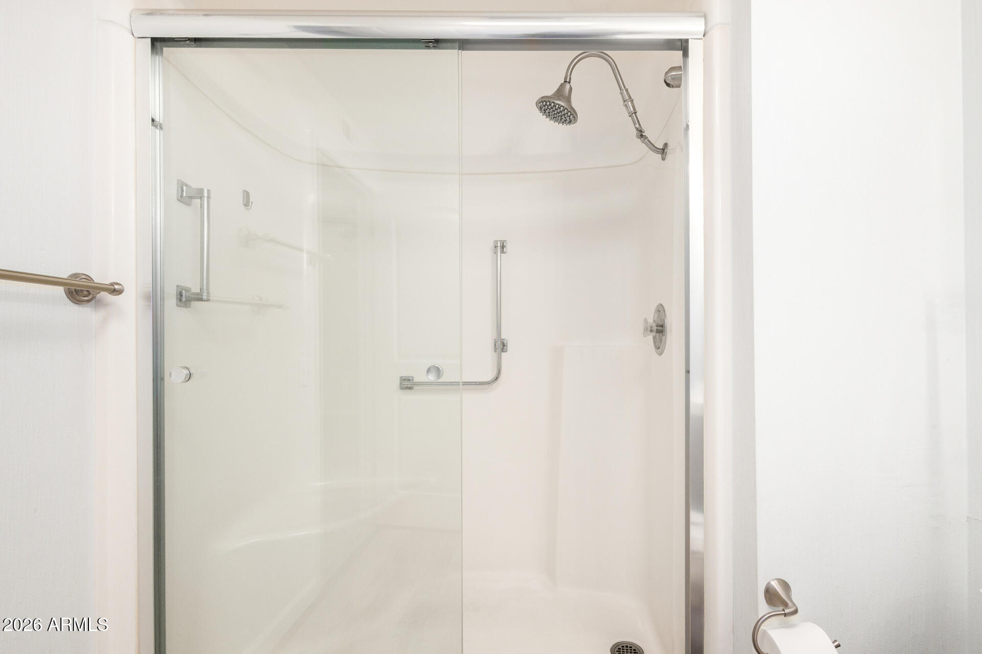 11118 West Mountain View Road Sun City, AZ 85351 - Photo 19 of 34 a bathroom with a shower