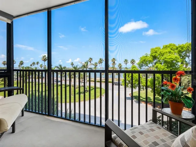a living room with furniture a dining table and chairs