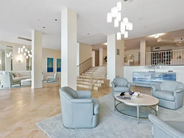 a view of swimming pool with outdoor seating