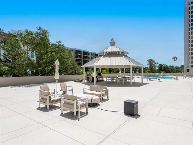 a view of parked cars in front of building