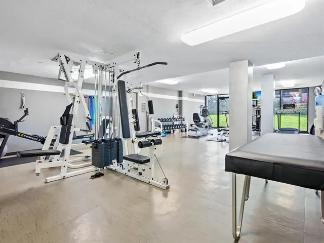 a view of swimming pool with outdoor seating and yard