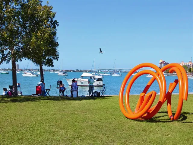 a view of path along with retail shop and buildings