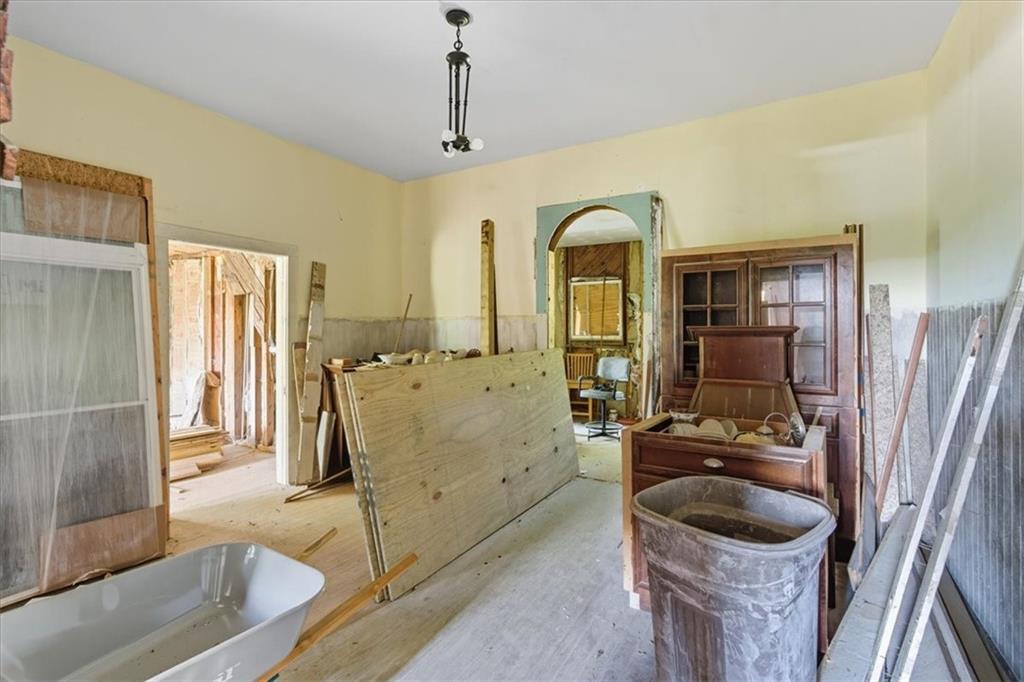 111 Bryan Street West Bremen, GA 30110 - Photo 13 of 32 a bathroom with a sink a toilet and shower
