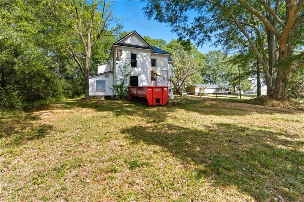 111 Bryan Street West Bremen, GA 30110 - Photo 2 of 32 a front view of a house with a yard