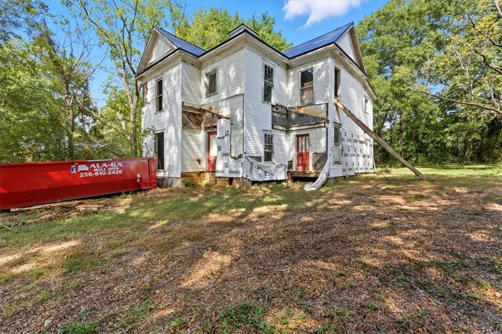 111 Bryan Street West Bremen, GA 30110 - Photo 4 of 32 a view of a house with a yard