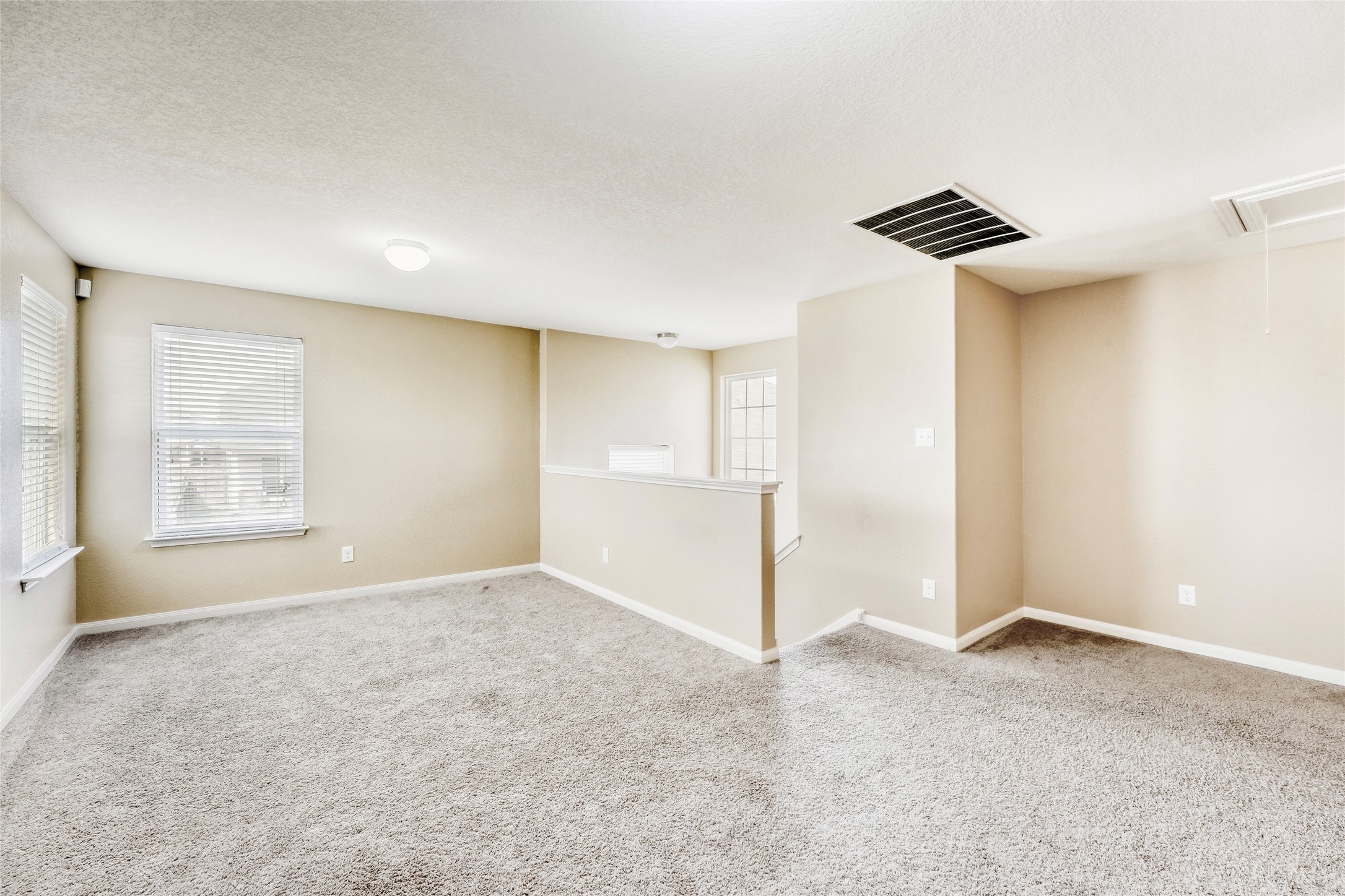 19621 Woodrow Wilson Street Manor, TX 78653 - Photo 17 of 34 a view of an empty room with a window