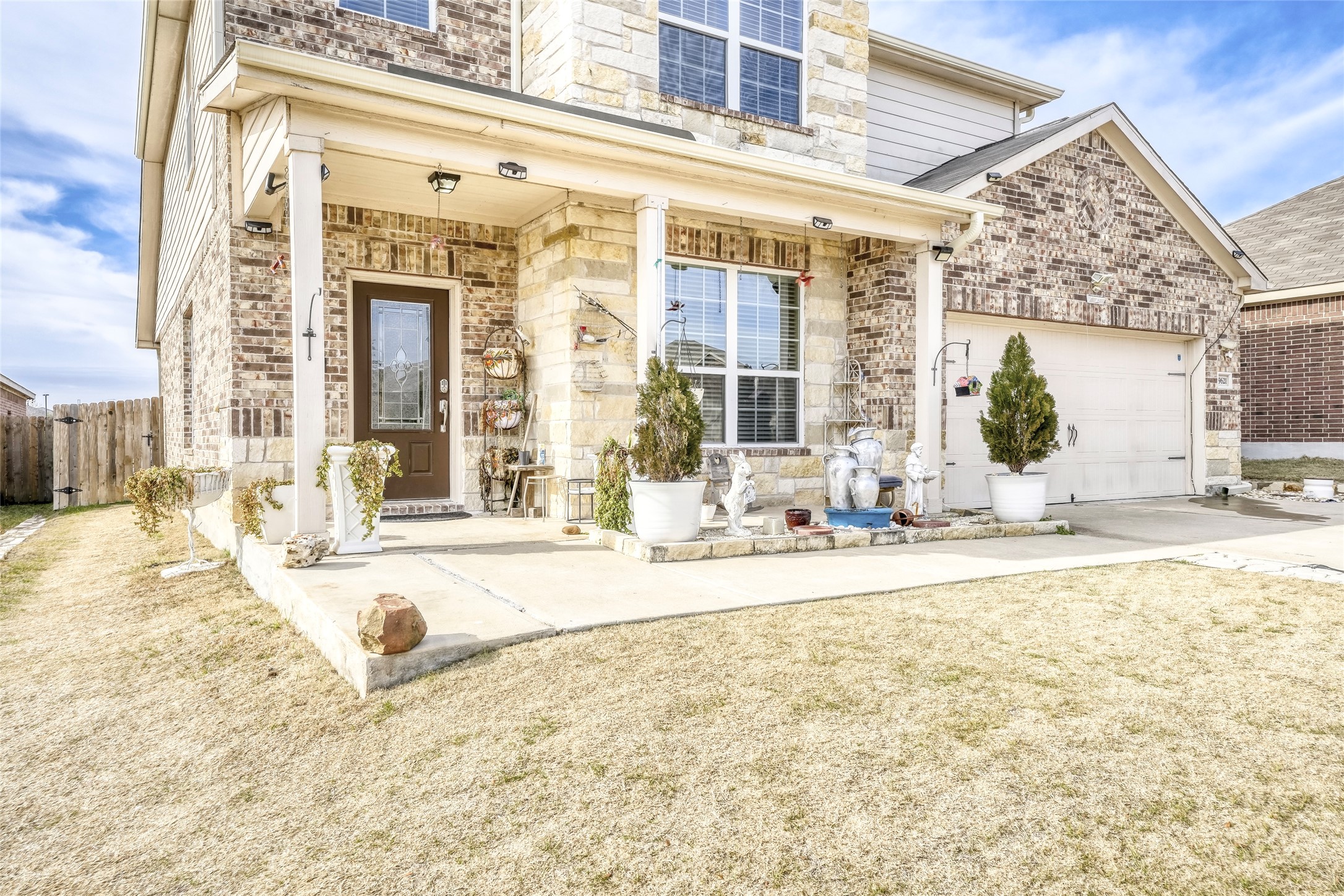 19621 Woodrow Wilson Street Manor, TX 78653 - Photo 2 of 34 front view of a building with a outdoor space