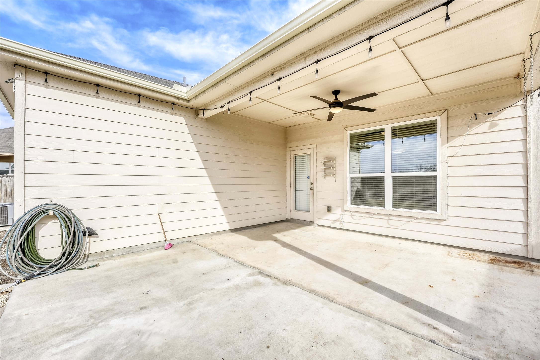 19621 Woodrow Wilson Street Manor, TX 78653 - Photo 26 of 34 a front view of a house with a large window