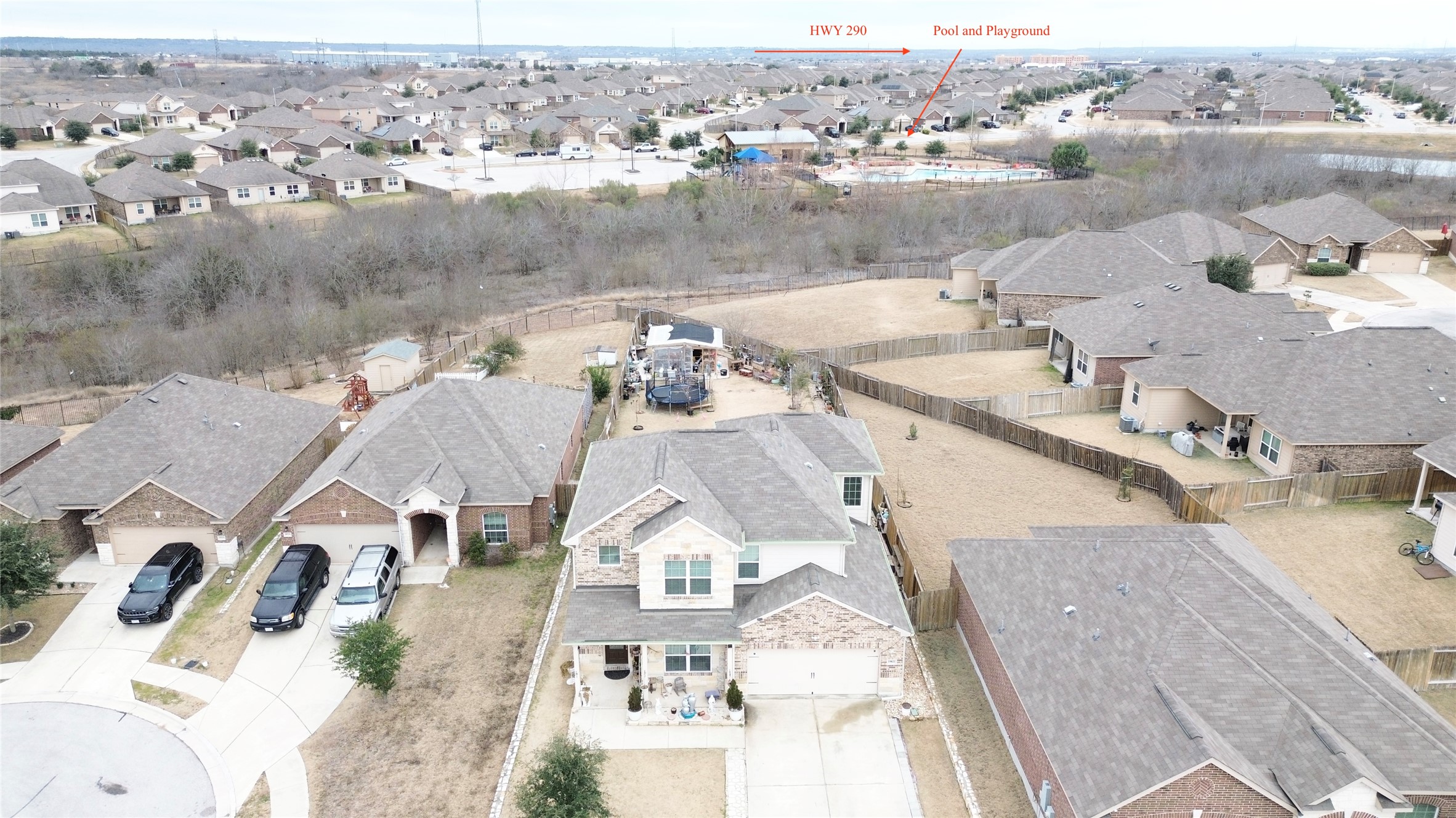 19621 Woodrow Wilson Street Manor, TX 78653 - Photo 30 of 34 an aerial view of a house with yard