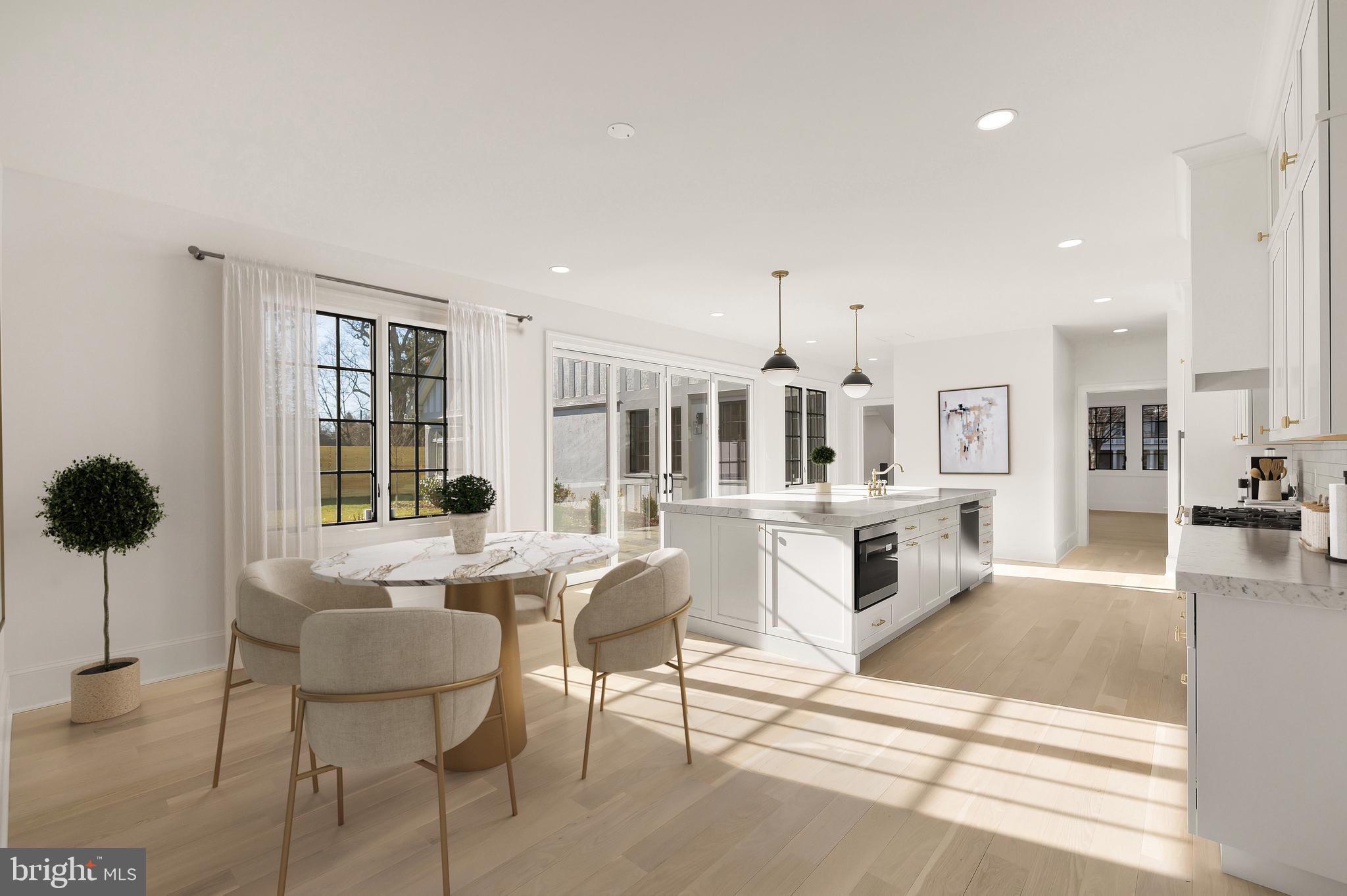 7611 Fairfax Road Bethesda, MD 20814 - Photo 13 of 44 a living room with furniture a rug kitchen view and a large window
