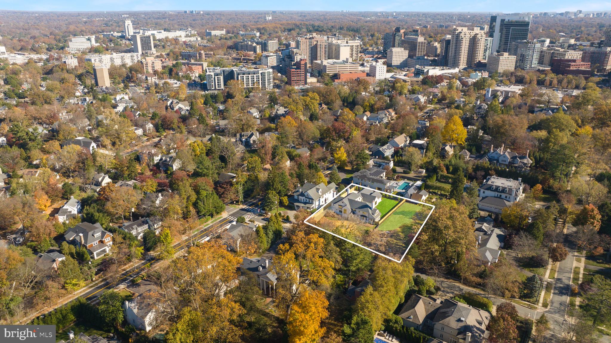 7611 Fairfax Road Bethesda, MD 20814 - Photo 4 of 44 an aerial view of residential houses with city view