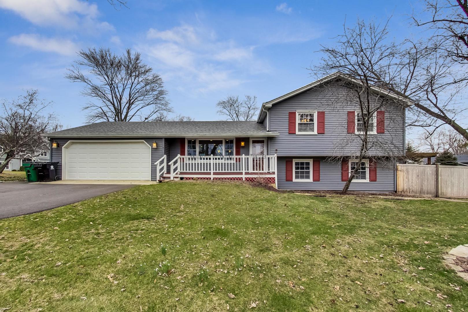 N369 Calvin Court Winfield, IL 60190 - Photo 1 of 41 a front view of a house with garden