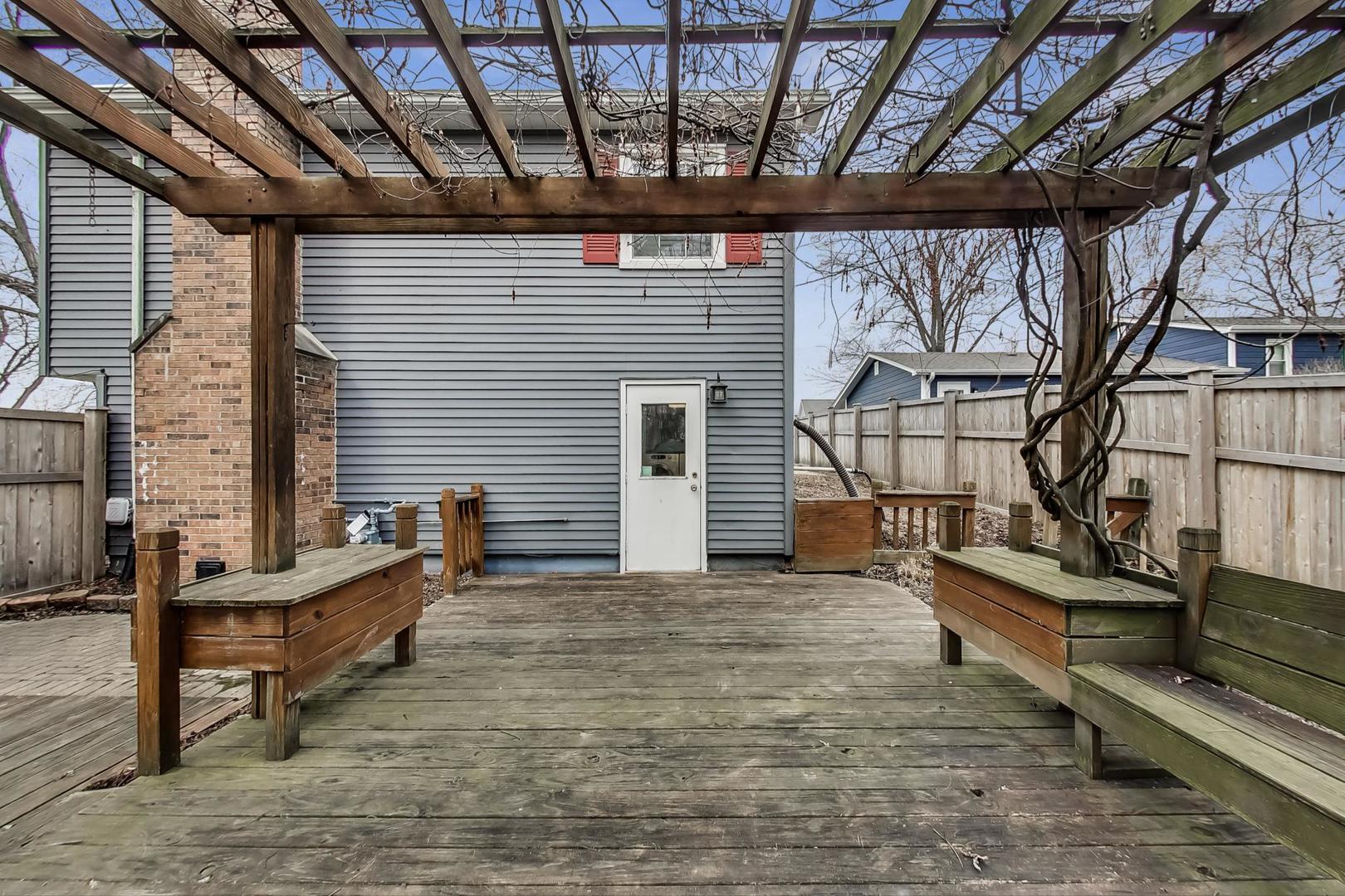 N369 Calvin Court Winfield, IL 60190 - Photo 29 of 41 a view of a chairs setting on the roof deck