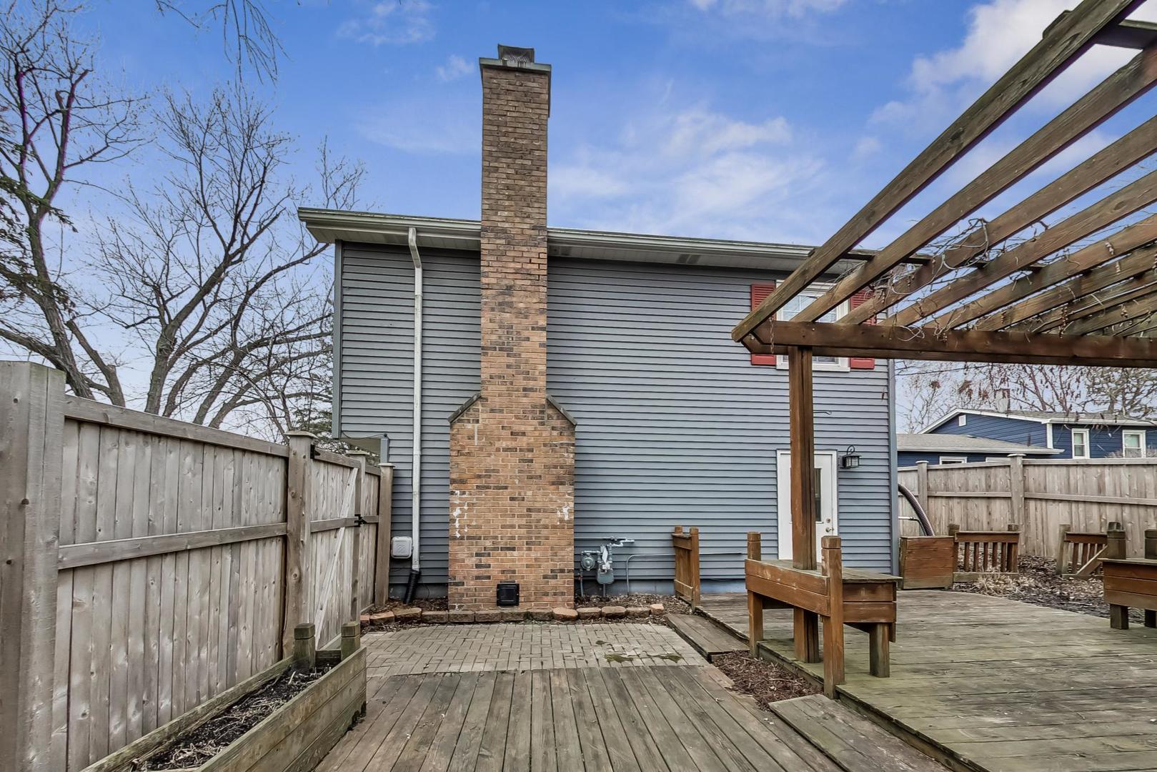 N369 Calvin Court Winfield, IL 60190 - Photo 32 of 41 a backyard of a house with seating space